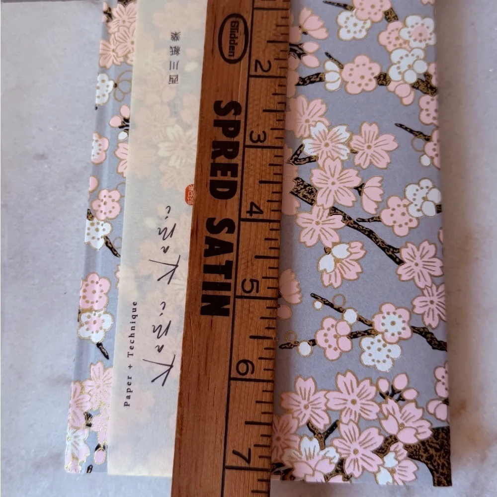 Japanese  notebook or journal featuring a cherry blossom (Sakura) pattern